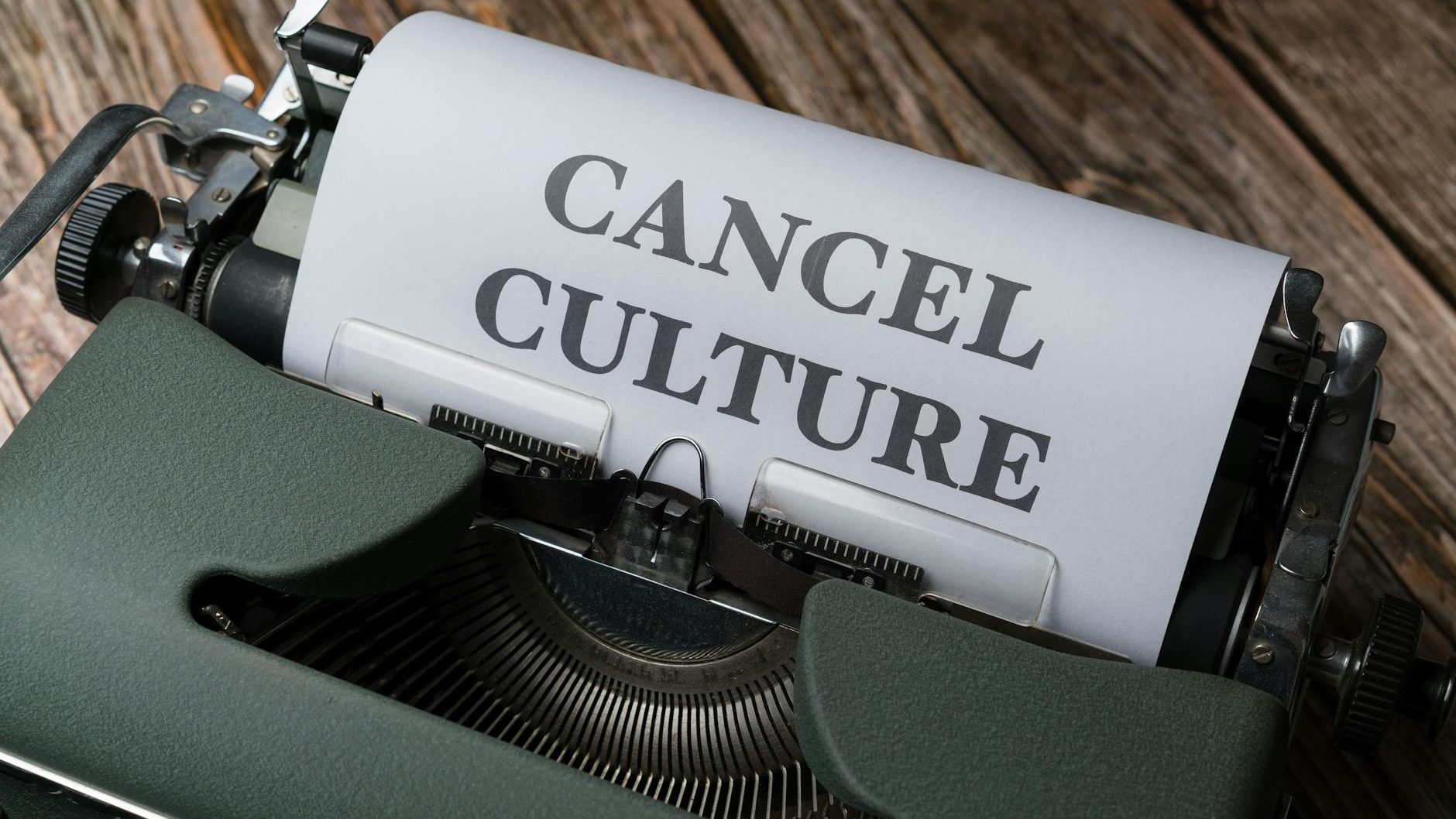 a typewriter with the word cancel culture written on it